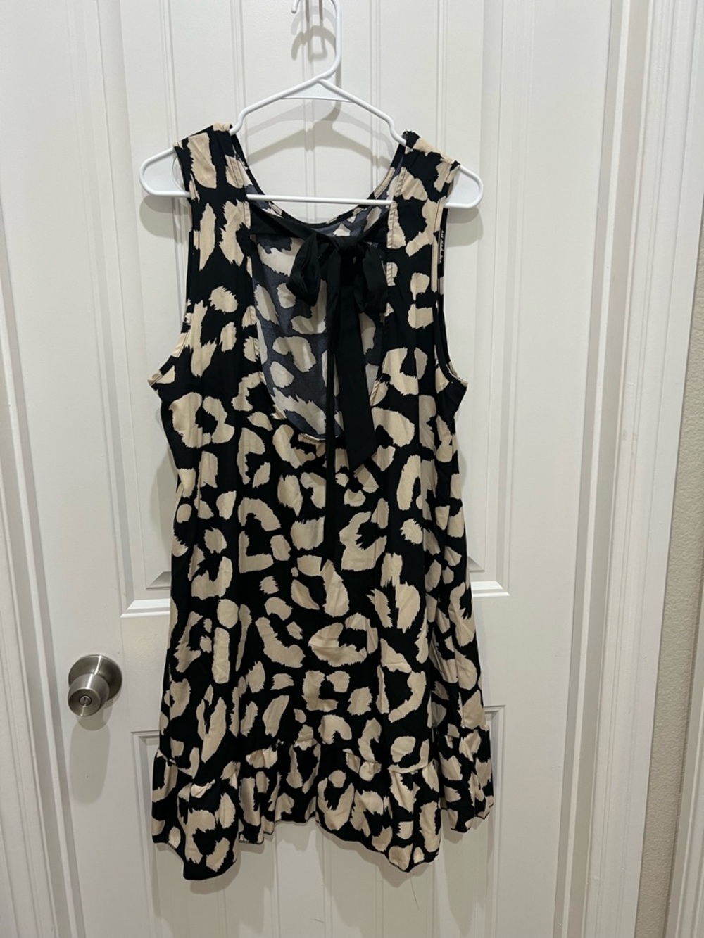 Sleeveless Black and Cream Animal Print Swing Dress - Picture 2 of 5